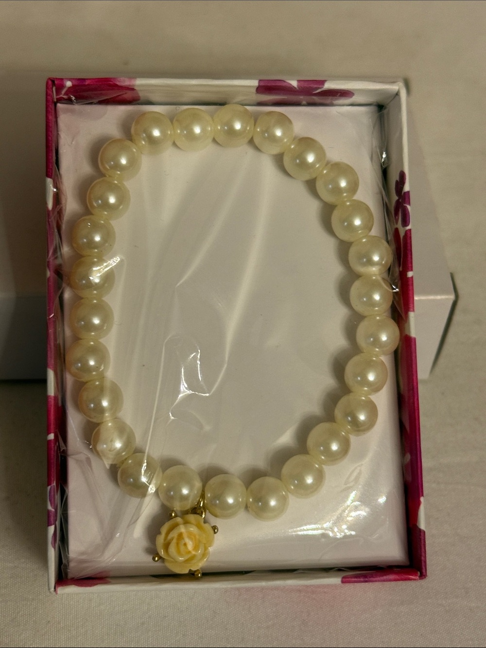 ❤️❤️ Avon Rosette Stretch Bracelet Faux Pearl Rose Charm NIB